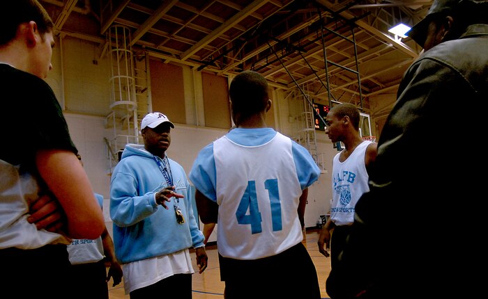Senior Airman Charles Barbee gives his team a motivational speech during the state championship game at the base gym Saturday. Airman Barbee is in the 437th Communications Squadron and is also the head coach of the Charleston AFB Blue youth basketball team. (U.S. Air Force photo/Senior Airman Nicholas Pilch)