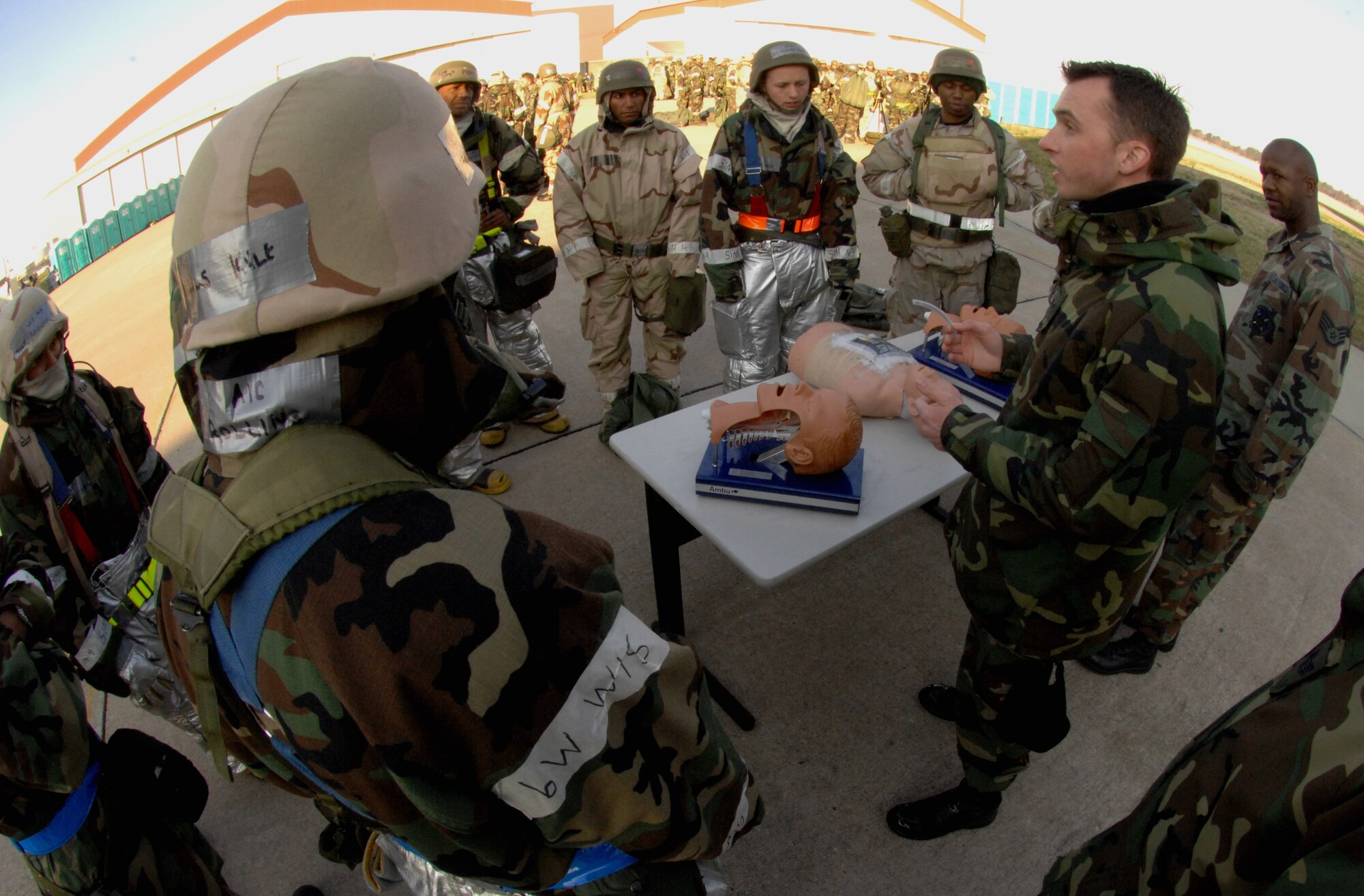 LANGLEY AIR FORCE BASE, Va. – Senior Airman Travis Fitzgerald, 10th Intelligence Squadron, teaches troops about "clearing the airway," during a self-aid buddy care exercise here March 11. The class was part of the Operational Readiness Inspection training day, where Airmen prepared for Langley's upcoming ORI, which is scheduled for April. During the training, troops practiced their ability to survive and operate, perform post attack reconnaissance, self-aid buddy care, and went over material from the Airman's manual and general knowledge on military operations. (U.S. Air Force photo/Senior Airman Cecil C. McCloud)