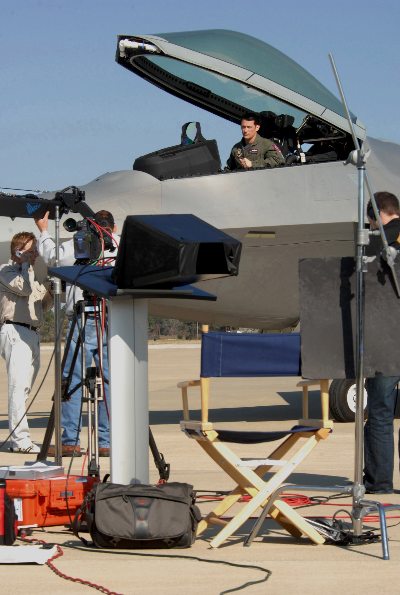 LANGLEY AIR FORCE BASE, Va. -- The Discovery Military Channel filmed an episode here March 11. The episode, which is part of the series "Showdown: Air Combat," will focus on the F-22 and its capabilities. Maj. Paul Moga, F-22 demonstration team pilot, will host the series, which is scheduled to premiere in June and will highlight different military aircraft.  (U.S. Air Force photo/Senior Airman Cecil C. McCloud)