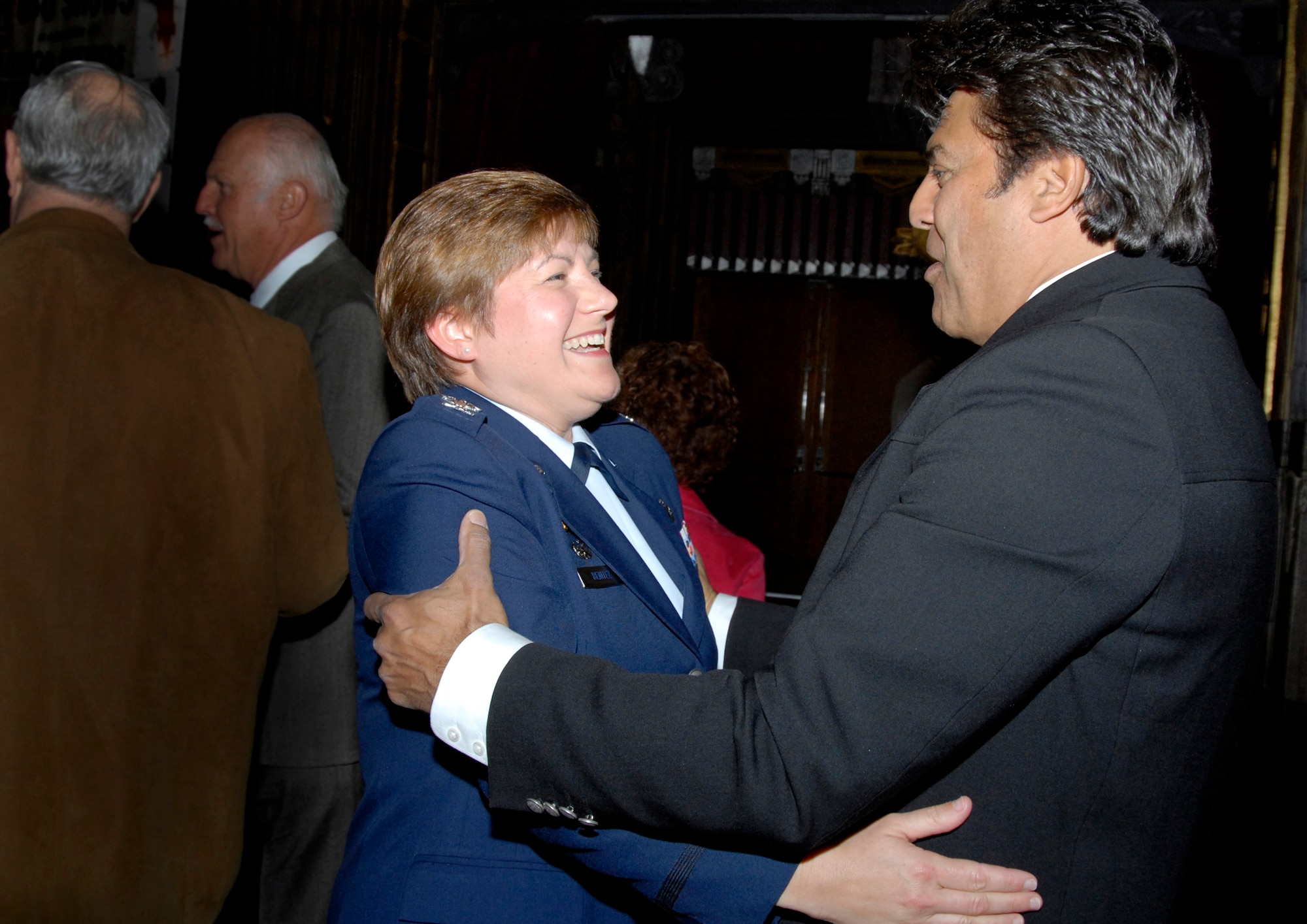 Col Nannette Benitez, 61st Mission Support Group commander, met actor Eric Estrada at a tribute to Johnny Grant held at the Pantages Theatre in Hollywood, March 6.  Grant passed away Jan. 9 at the age of 84.  His friends and Hollywood stars reminisced about his life as the Honorary Mayor of Hollywood, a retired major general in the California State Military Reserve, and regular USO entertainer and emcee. A number of Airmen from Los Angeles AFB help send Grant off on his last USO tour in December 2007. (Photo by Joe Juarez)