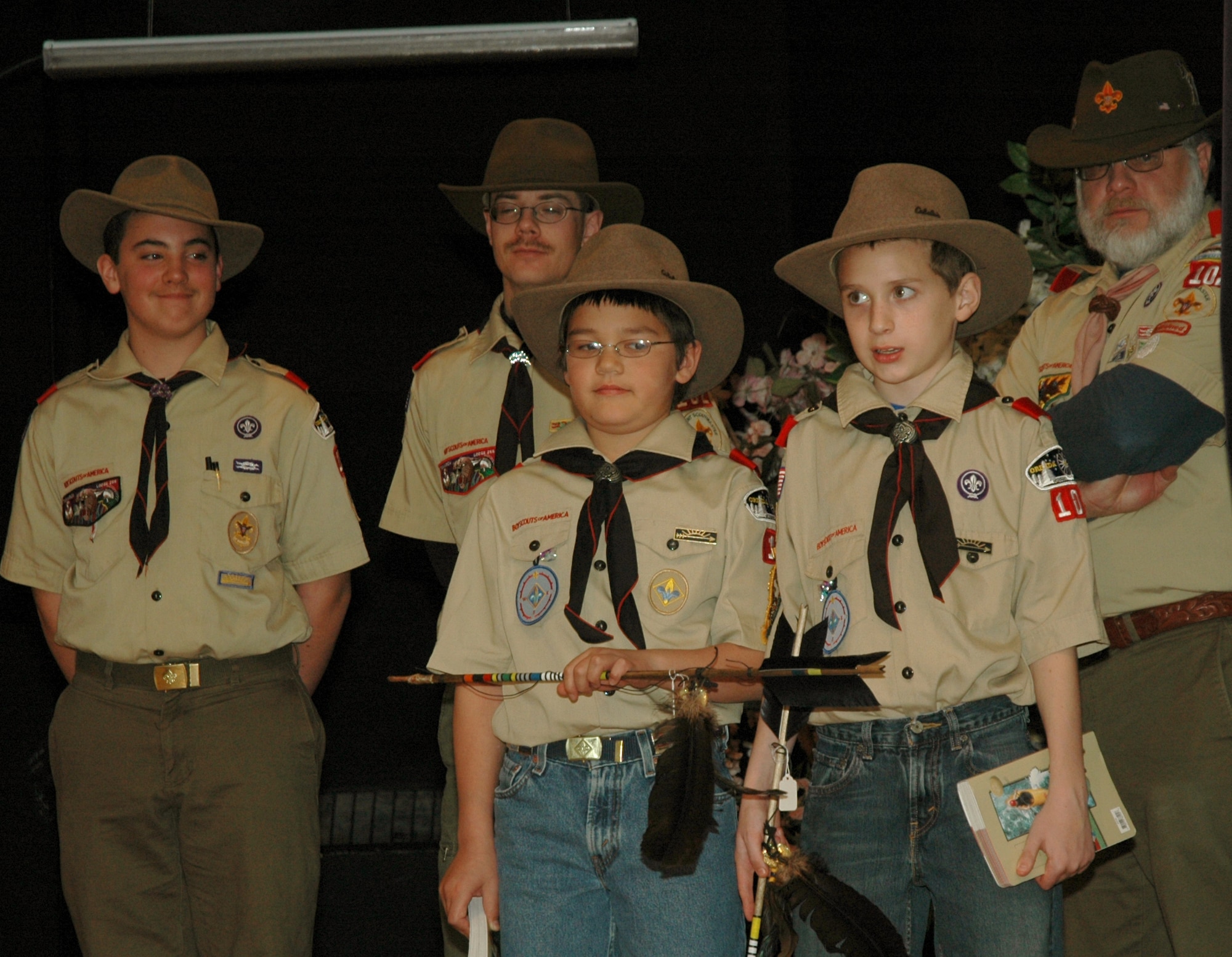 MOUNTAIN HOME AIR FORCE BASE, Idaho -- Webelos Two Scouts, Lucas Nickerson and Nick Dealey, made the transition from Cub Scouts to Boy Scouts during a Arrow of Light Ceremony and Crossover at the Mountain Home Air Force Base Cub Scouts, Pack 102, 2008 Blue and Gold banquet March 8. More then 80 scouts, den leaders, family and friends gathered to celebrated the Boy Scouts of America's birthday and congratulate those scouts who moved up in the ranks. (U.S. Air Force photo/ Senior Airman Megan P. Lyon)