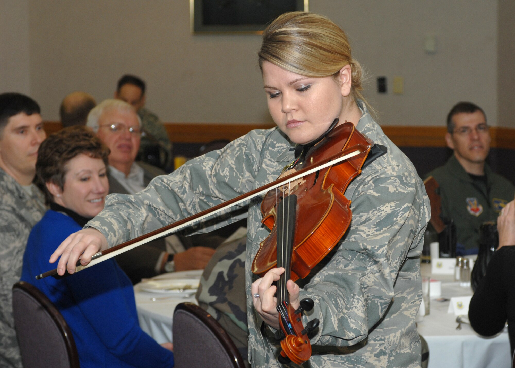 WHITEMAN AIR FORCE BASE, Mo. – 1st Lt. Candace Cutrufo, 509th Bomb Wing Public Affairs, plays a viola during the National Prayer Breakfast March 11. (U.S. Air Force photo/Tech. Sgt. Samuel A. Park)
