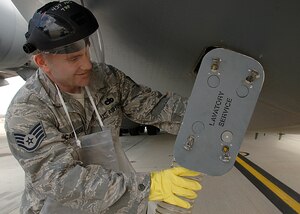 Staff Sgt. James Scarbrough services a C-17 lavatory on the Charleston Air Force Base flightline March 11, 2008.  Sergeant Scarbrough is a fleet services supervisor with the 437th Aerial Port Squadron. (U.S. Air Force photo by Airman 1st Class Katie Gieratz)