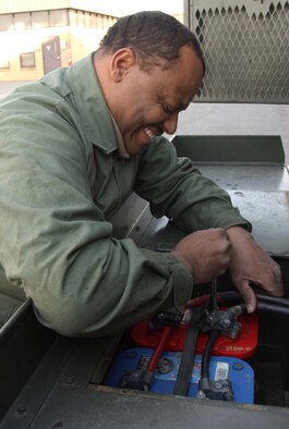 ANDREWS AIR FORCE BASE, Md. -- Tech. Sgt. Walter King, 459th Maintenance Squadron aerospace ground equipment specialist, troubleshoots a battery fault on a generator. (U.S. Air Force photo/Tech. Sgt. Eric Sharman)