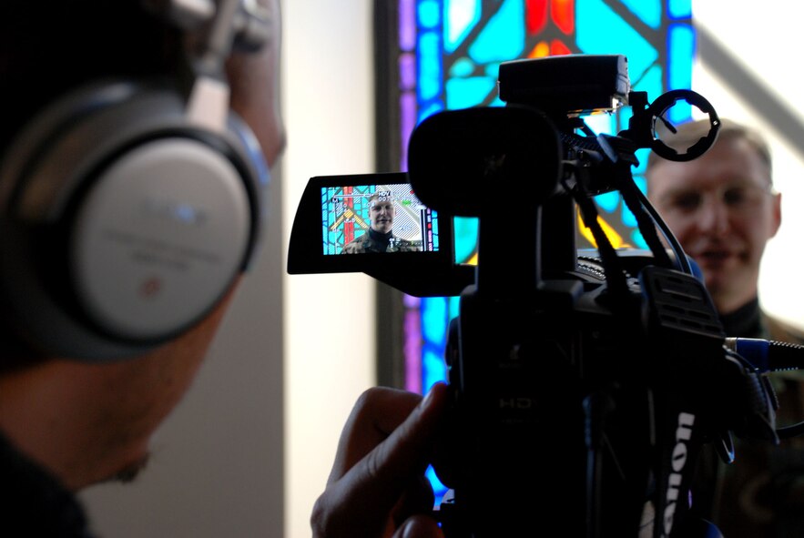 Movie star in the making?  Always ready always there...Master Sgt. Harold Von De Bur is a 932nd Airlift Wing chaplain's assistant temporarily located at Chapel One, room 122 during UTA Hours: 0730-1100, or 1230-1600 and by appointment.  Broadcasting graduate students from the University of Illinois recently interviewed him.  The wing headquarters building is currently under renovation.  Photo/Capt. Stan Paregien  