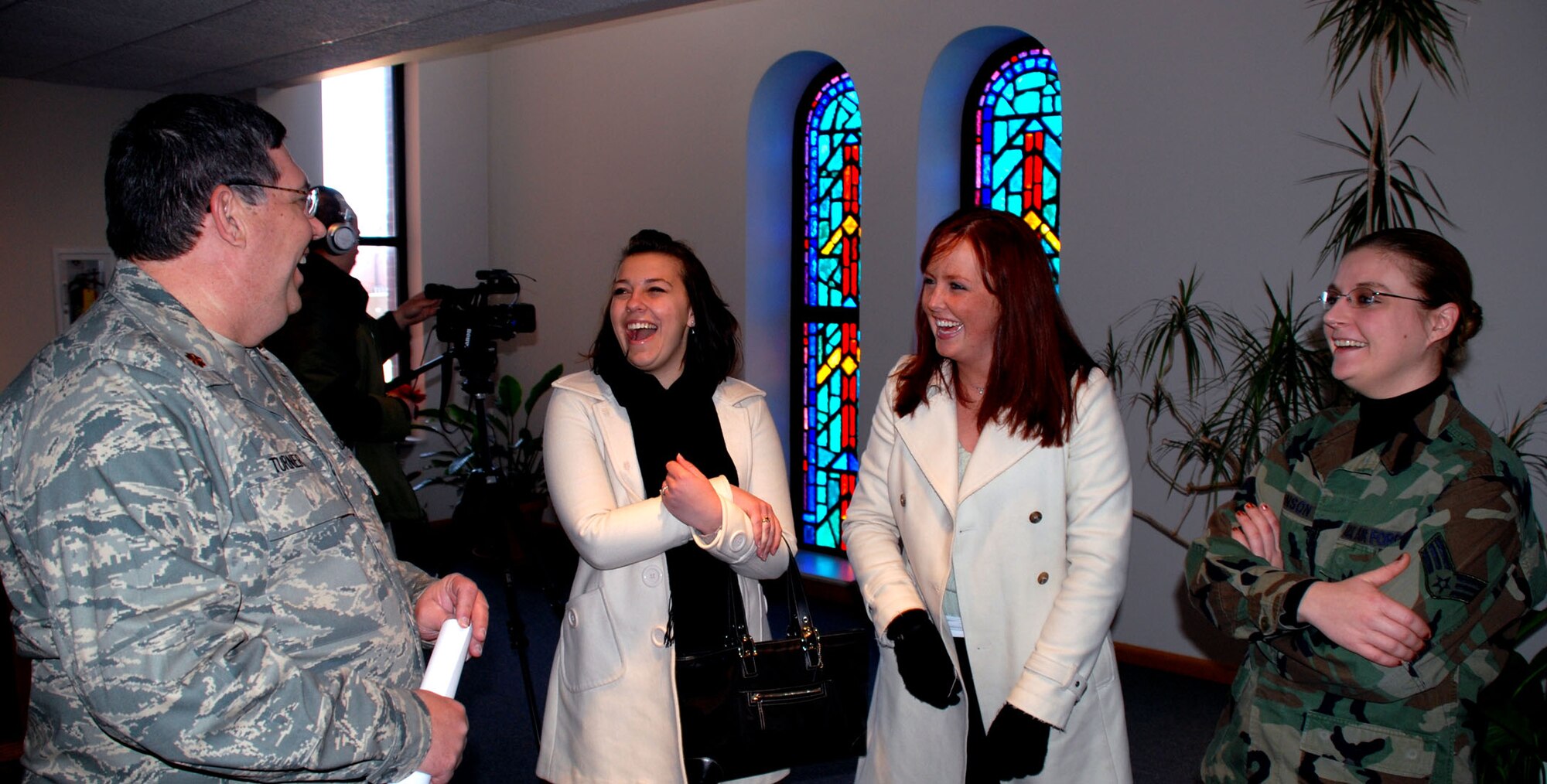 The 932nd Airlift Wing Chaplain (Maj.) Keith Turner (left) and his assistant, Senior Airman Heather Johnson (right), welcomed three broadcasters from the University of Illinois during a recent tour.  Telling the story of their Air Force Reserve work gave the students ideas for their final project.  Chaplain Turner and his staff are temporarily located at Chapel One, room 122 during UTA Hours: 0730-1100, or 1230-1600 and by appointment. He is part of the 932nd Airlift Wing.  The wing headquarters building is currently under renovation.  Photo/Capt. Stan Paregien