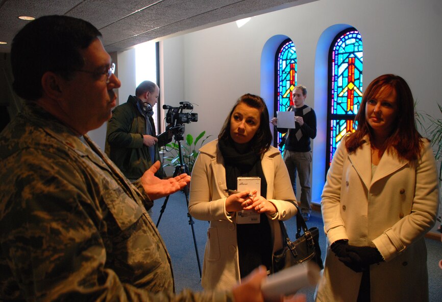 The 932nd Airlift Wing Chaplain (Maj.) Keith Turner, welcomes broadcast and journalism students from the University of Illinois during a recent tour.  Telling the story of his Air Force Reserve work was intriguing to the students as they prepared their final semester project.  He is part of the Air Force Reserve Command's only Illinois flying unit, the 932nd Airlift Wing.  Photo/Capt. Stan Paregien