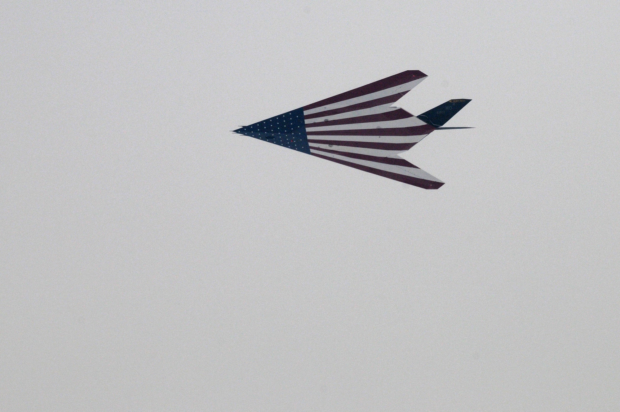 An F-117 Nighthawk performs a flyover through the fog during the conclusion of the F-117 Nighthawk farewell ceremony at Wright-Patterson Air Force Base, Ohio, March 11.  (U.S. Air Force photo/Staff Sgt Joshua Strang)
