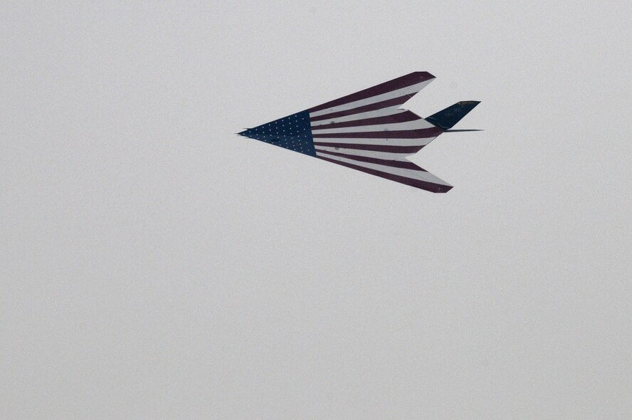 An F-117 Nighthawk performs a flyover through the fog during the conclusion of the F-117 Nighthawk farewell ceremony at Wright-Patterson Air Force Base, Ohio, March 11. (Air Force photo by Staff Sgt Joshua Strang)