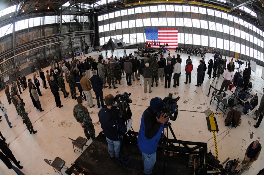 A military and civilian audience listens to guest speakers during the F-117 Nighthawk farewell ceremony at Wright-Patterson Air Force Base, Ohio, March 11. The ceremony concluded with a single ship flyover. (Air Force photo by Staff Sgt Joshua Strang)