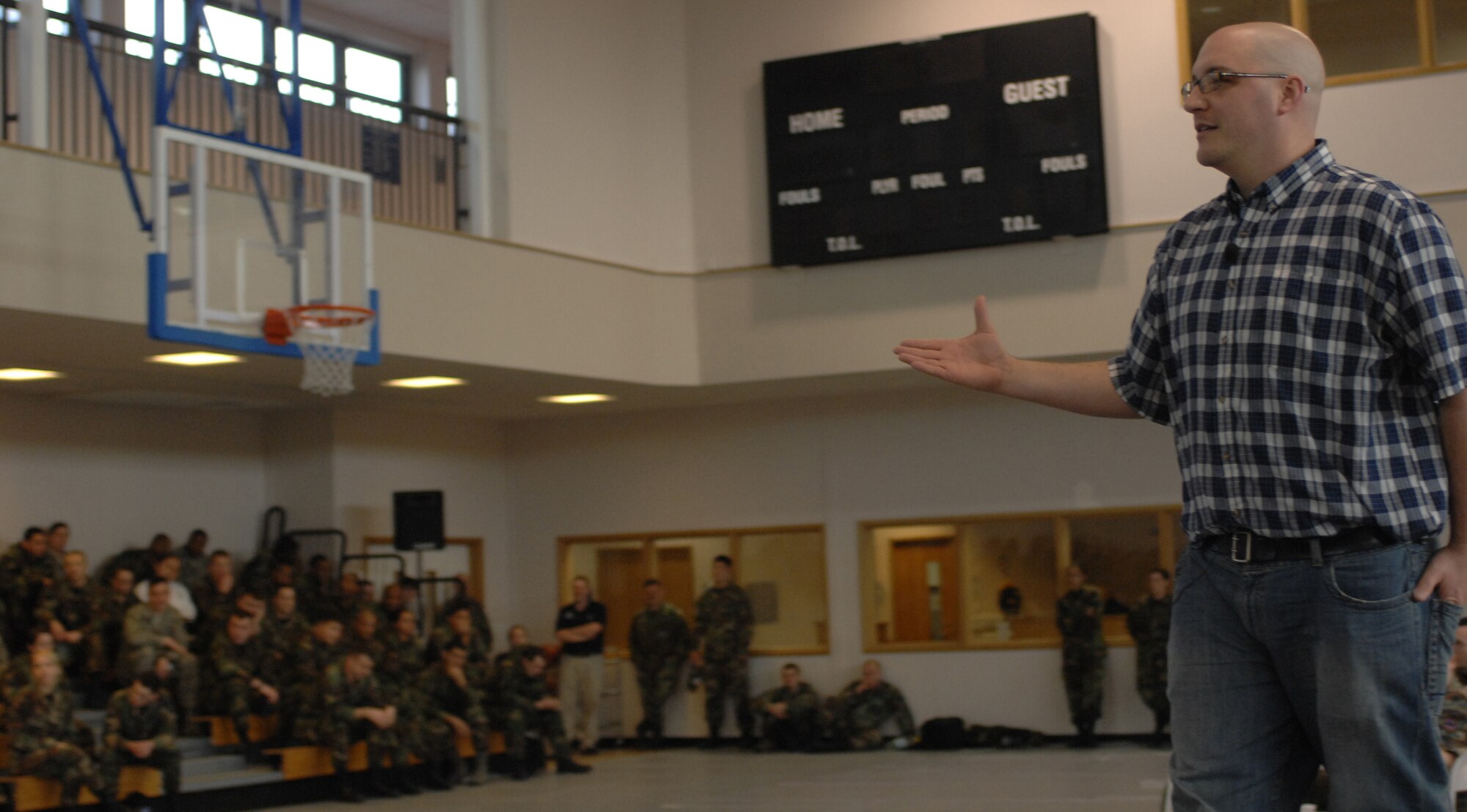 Actor Harry LaCoste of Deana's Educational Theater teaches Team Mildenhall Airmen about sexual assault awareness during “Remote Control” Feb. 28.  The performance was one of the last in the troupe’s tour of U.S. Air Forces in Europe bases, and it focused on military-specific aspects of sexual assault.  (U.S. Air Force photo by Airman 1st Class Brad Smith)