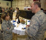 KUNSAN AIR BASE, South Korea -- Lieutenant General Terry Gabreski, Air Force Materiel Command vice commander (left), speaks with Colonel Creig Rice, 8th Fighter Wing vice commander (right), during the annual Maintenance Professional of the Year banquet here May 8.  General Gabreski was the guest speaker for the MPOY banquet which showcases outstanding Airmen and civilians who distinguish themselves in a number of categories within the 8th Maintenance Group.  (U.S. Air Force photo/Senior Airman Steven R. Doty)