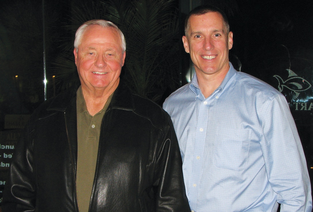 Raymond Kiemel and Col. Mark Toal, commanding officer of 8th Marine Corps District, meet for the first time in March 2008. Kiemel was a drill instructor for Toal's father in 1953. Toal felt compelled to meet the man whom his father had shared so many stories about.