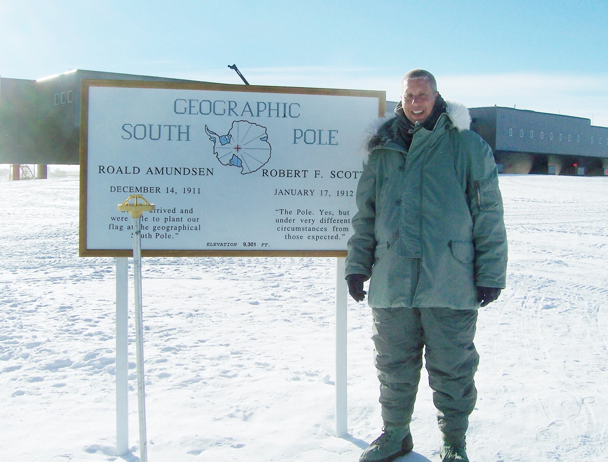 MSgt Michael Renshaw stands at the Geographical South Pole while the temperature at the time was minus 45 degrees. The Geographical pole actually moves 20 feet per year and he was standing atop 2 miles of snow.