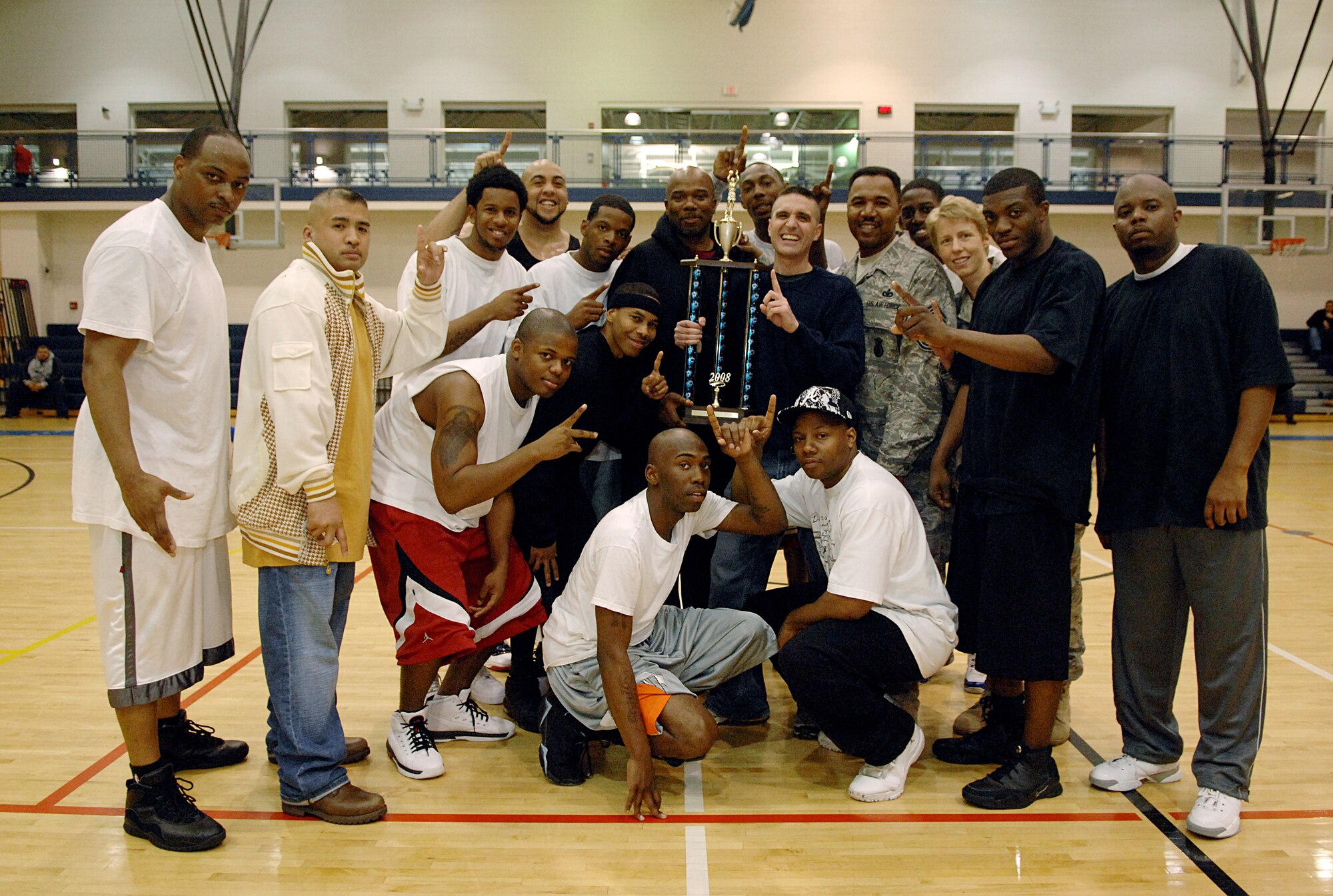 LANGLEY AIR FORCE BASE, Va. -- The 1st Security Forces Intramural Under-35 Basketball team poses for a photo after defeating the 1st Medical Group in the Langley Intramural Championship game. The 1st SFS defeated 1st MDG, 49-39. (U.S. Air Force photo/Senior Airman Vernon Young)