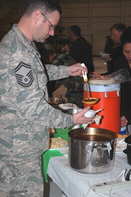 Members of the 302nd Airlift Wing competed for top honors at the annual Chili Cook-off at Peterson Air Force Base, Colo. on March 13.  Airmen and civilian employees were judged by spouses, friends, and their unit and honorary commanders. (U.S. Air Force photo/Capt. Heather N. Garrett)