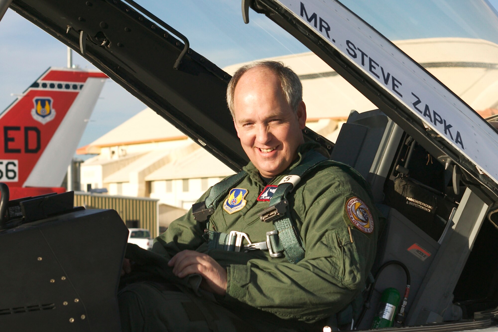 Steve Zapka, Rohmann Services Inc. project manager, recently completed 25 years as an Edwards aerial photographer. Mr. Zapka arrived at Edwards on Sept. 1, 1982, as an airman first class. (Courtesy photo) 