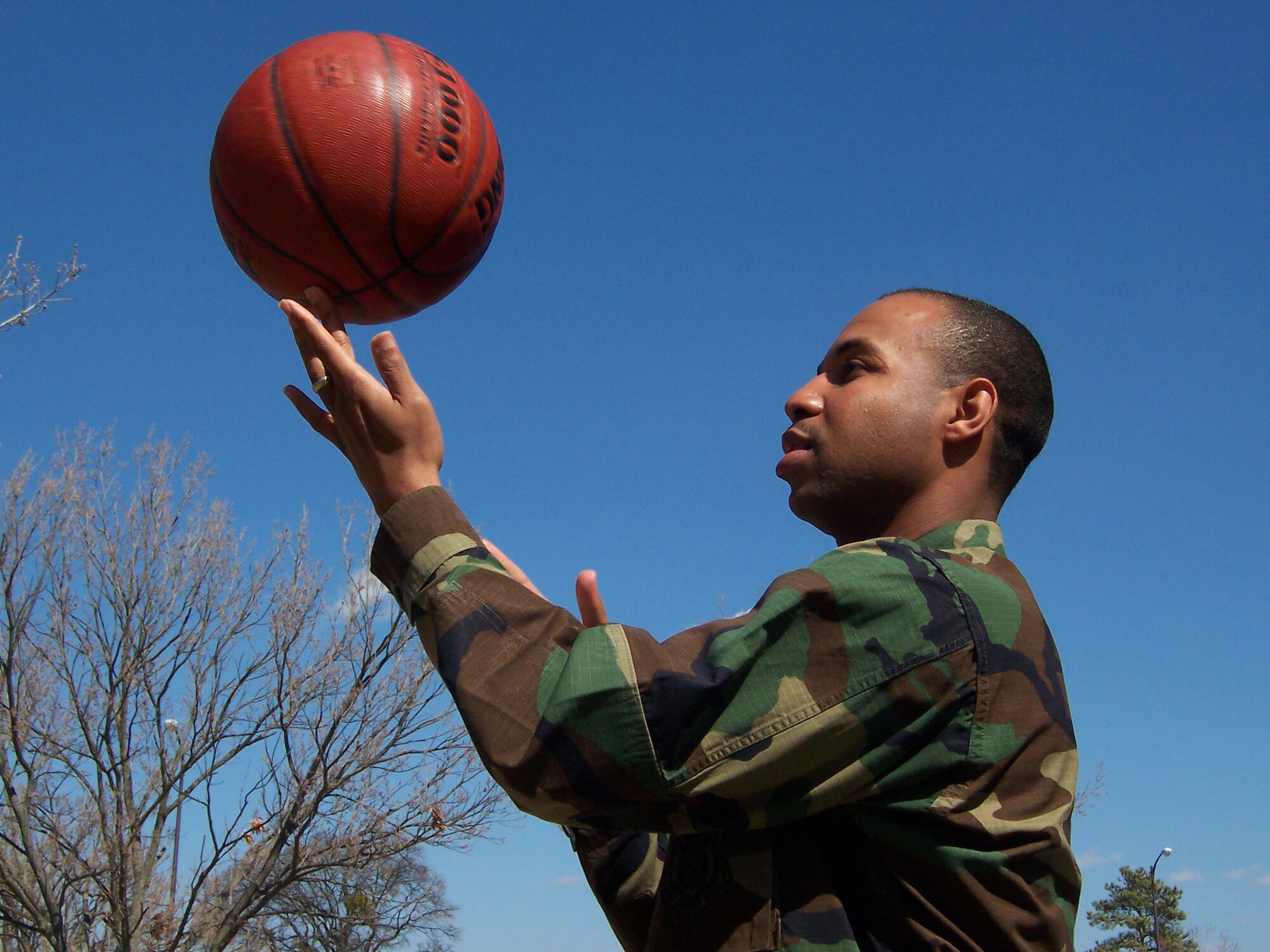Capt. Kurtis Darden, 440th Airlift Wing, is captain for the All Air Force basketball team. The Reservist from Pope Air Force Base, N.C., is shooting for a “three-peat” in the Armed Forces Basketball Tournament March 23-28, and is hoping the Air Force team wins its third gold. (U.S. Air Force Photo/Tech. Sgt. Steve Staedler)