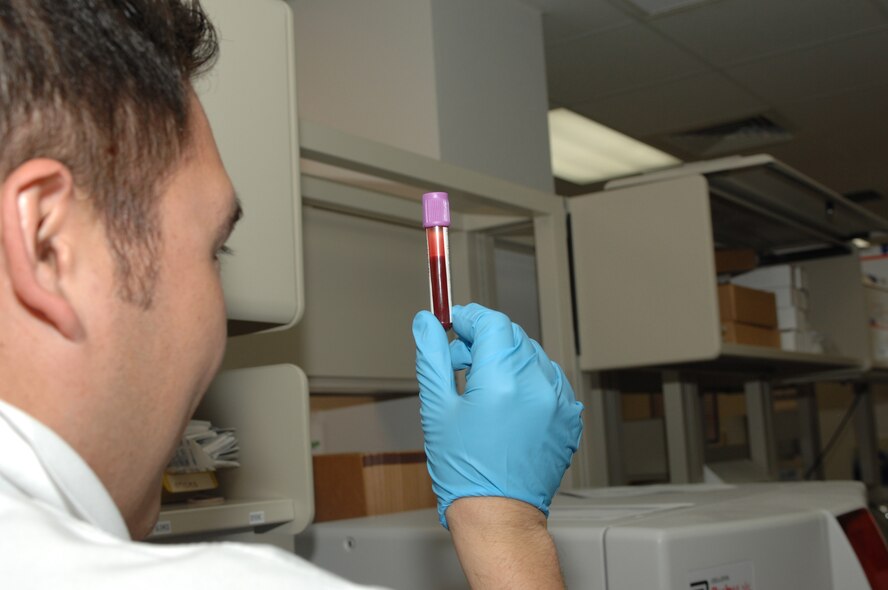 DYESS AIR FORCE BASE, Texas -- Senior Airman Rory Jones, lab technician, checks for clotting in a blood sample at the 7th Medical Group, March 10. The lab technicians are responsible for ensuring the blood is properly mixed and there is enough of a sample for a test. (U.S. Air Force photo by SrA Courtney Richardson)