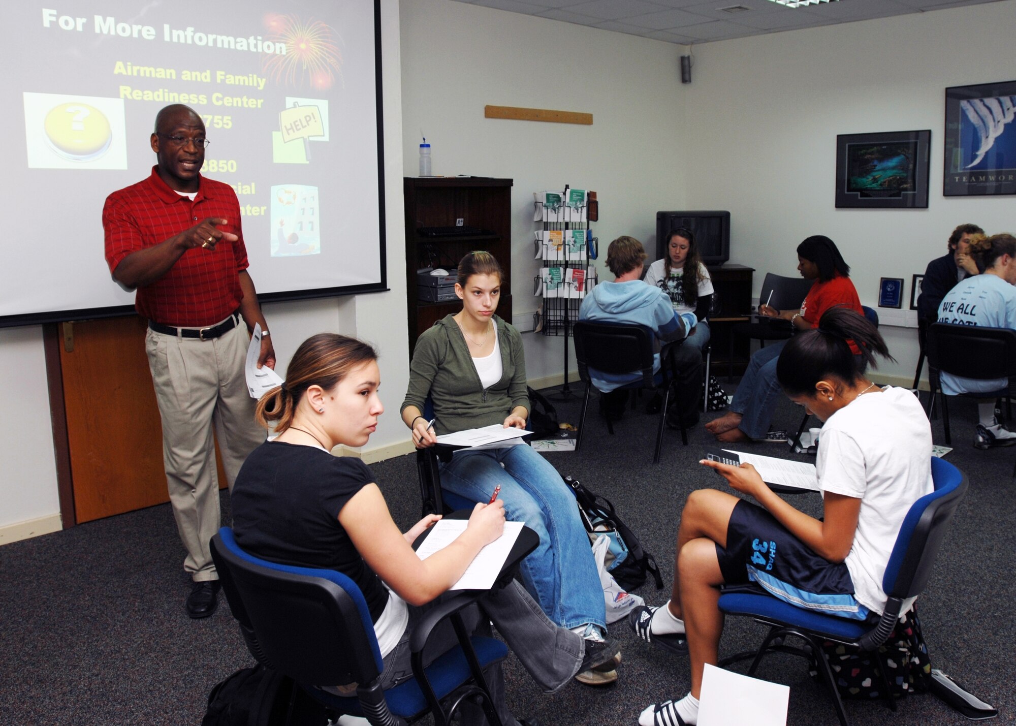 Mr. Byron Clark, 39th Mission Support Squadron Airman and Family Readiness Center Community Readiness consultant, briefs Incirlik Unit School seniors on financial responsibility and budgeting March 13 at the AFRC. The financial lesson is part of the four day class called Life Skills for Seniors and is taught annually to high school students before they graduate. (U.S. Air Force photo by Staff Sgt. Jeff Nevison)