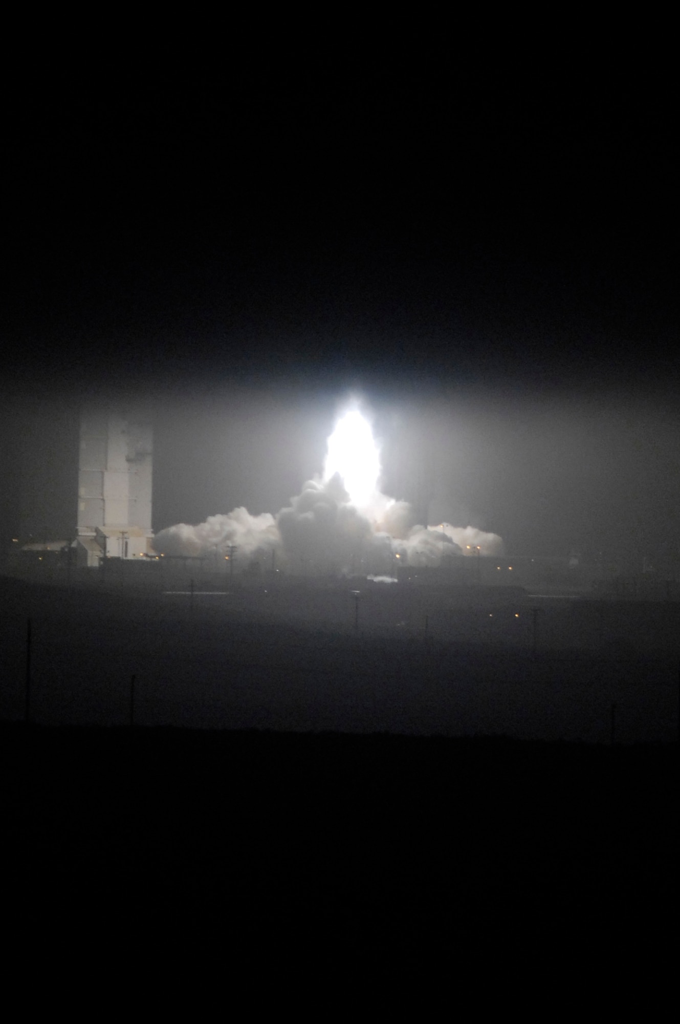 VANDENBERG AIR FORCE BASE, Calif. -- An Atlas V launches from Space Launch Complex-3 on March 12. Col. Steve Tanous, 30th Space Wing commander, was the space lift commander for this mission. This was the first Atlas V launched from Vandenberg and the west coast, as well as the first launch of the year. This milestone for Team Vandenberg is the product of the combined efforts of the 30th Space Wing, the National Reconnaissance Office, United Launch Alliance, the Space and Missile Systems Center, the Aerospace Corporation and more. SLC 3 was significantly modified to get ready for the next generation of space launch vehicles. The Atlas V will be its first launch since the modifications were completed. Previously used for 21 Atlas II launches, the pad received significant upgrades to accommodate the larger and more powerful booster. The tower was made taller, the overhang was extended with a much bigger crane, and the entire pad deck was reconfigured. The pad also features a brand new fixed launch platform. (U.S. Air Force photo/Airman 1st Class Christian Thomas) 


