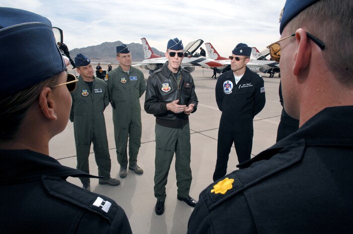 NELLIS AIR FORCE BASE, Nev. -- The Commander of Air Combat Command, General John Corley, speaks with the U.S. Air Force Thunderbird officers at the acceptance show at Nellis Air Force Base, Nev., March 11. The acceptance show marks the beginning of the 2008 show season, which includes 37 showsites in the United States and Canada. (U.S. Air Force photo/Tech. Sgt. Justin D. Pyle)