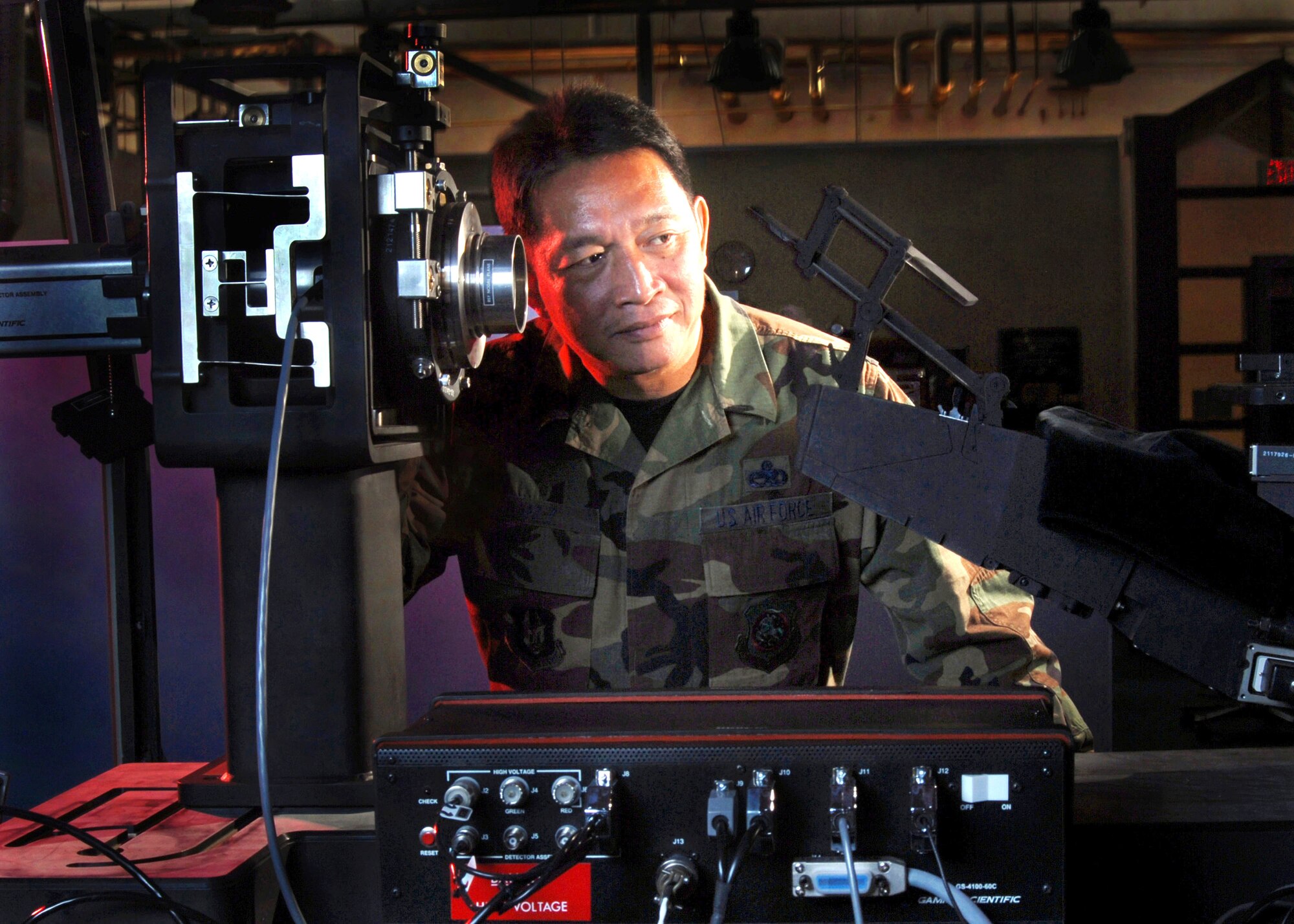 Air Force Master Sgt. Onyx Banez, an avionics integrated technician from the 452nd Maintenance Squadron, March Air Reserve Base, Calif., verifies the alignment of the telescope of a Display Unit Test Set (DUTS) while testing a Head-Up Display (HUD) of a C-17 Globemaster III cargo aircraft at March Air Reserve Base, Calif. Avionics technicians install, maintain and repair electronic and electrical systems on all types of aircraft and they also maintain a high degree of readiness here to deploy worldwide to support wartime and contingency operations, and operations other than war in support of national interests and objectives. (U.S. Air Force photo by Val Gempis)