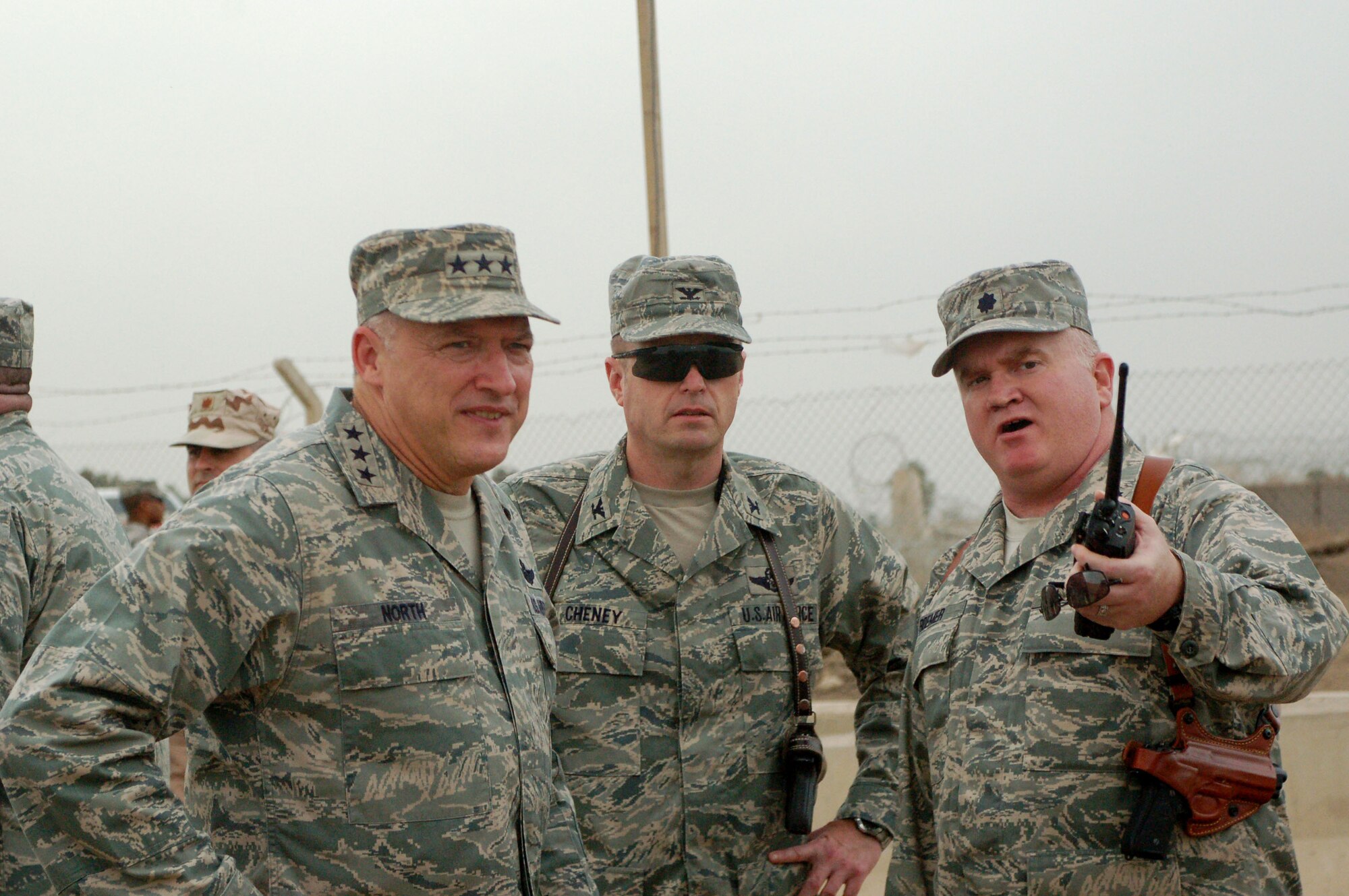 SATHER AIR BASE, Iraq -- Lt. Col. Pat Roemer, 447th Expeditionary Civil Engineer Squadron commander, points out areas under construction at the Sather Air Base passenger terminal to Lt. Gen. Gary North, commander of the 9th Air Force and U.S. Air Forces Central, while Col. Fred Cheney, 447th Air Expeditionary Group commander, observes the discussion.  (U.S. Air Force photo/Tech. Sgt. Amanda Callahan)