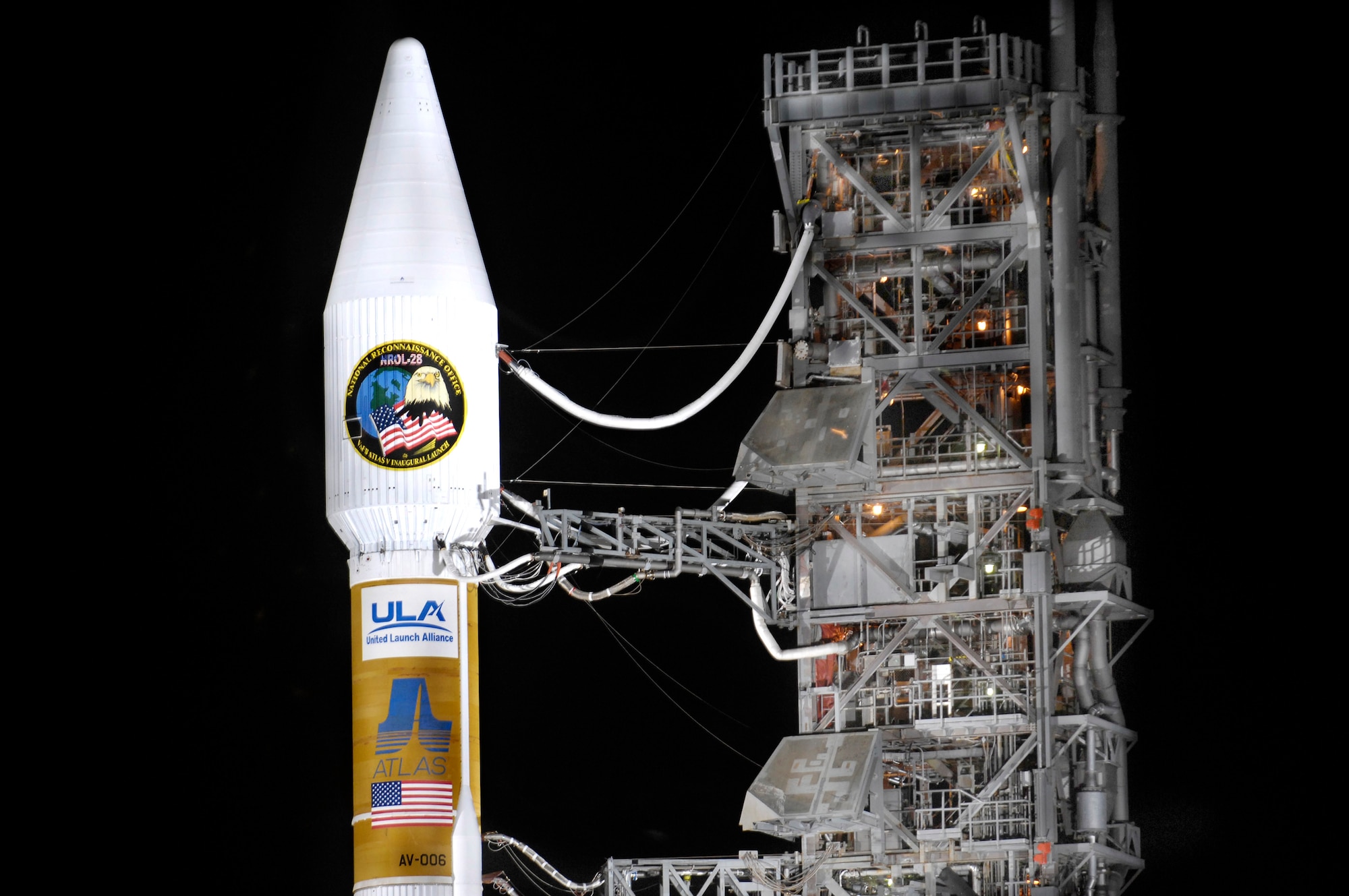 An Atlas V stands on Space Launch Complex-3 during its mobile servicing tower rollback on March 12.  The Atlas launched at 3:01 a.m. PDT March 13 at Vandenberg Air Force Base, Calif.  It carried a National Reconnaissance Office payload and was the first Atlas V to launch from the West Coast.  (U.S. Air Force photo/Airman 1st Class Christian Thomas)