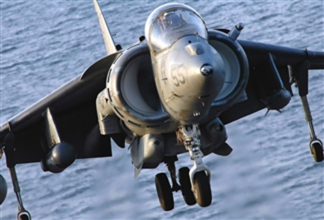 A U.S. Marine Corps AV-8B Harrier lands on the flight deck of the amphibious assault ship USS Tarawa (LHA 1) as the ship operates in the Persian Gulf on March 12, 2008.  The Harrier and pilot are assigned to Marine Medium Helicopter Squadron 166 (Reinforced).  