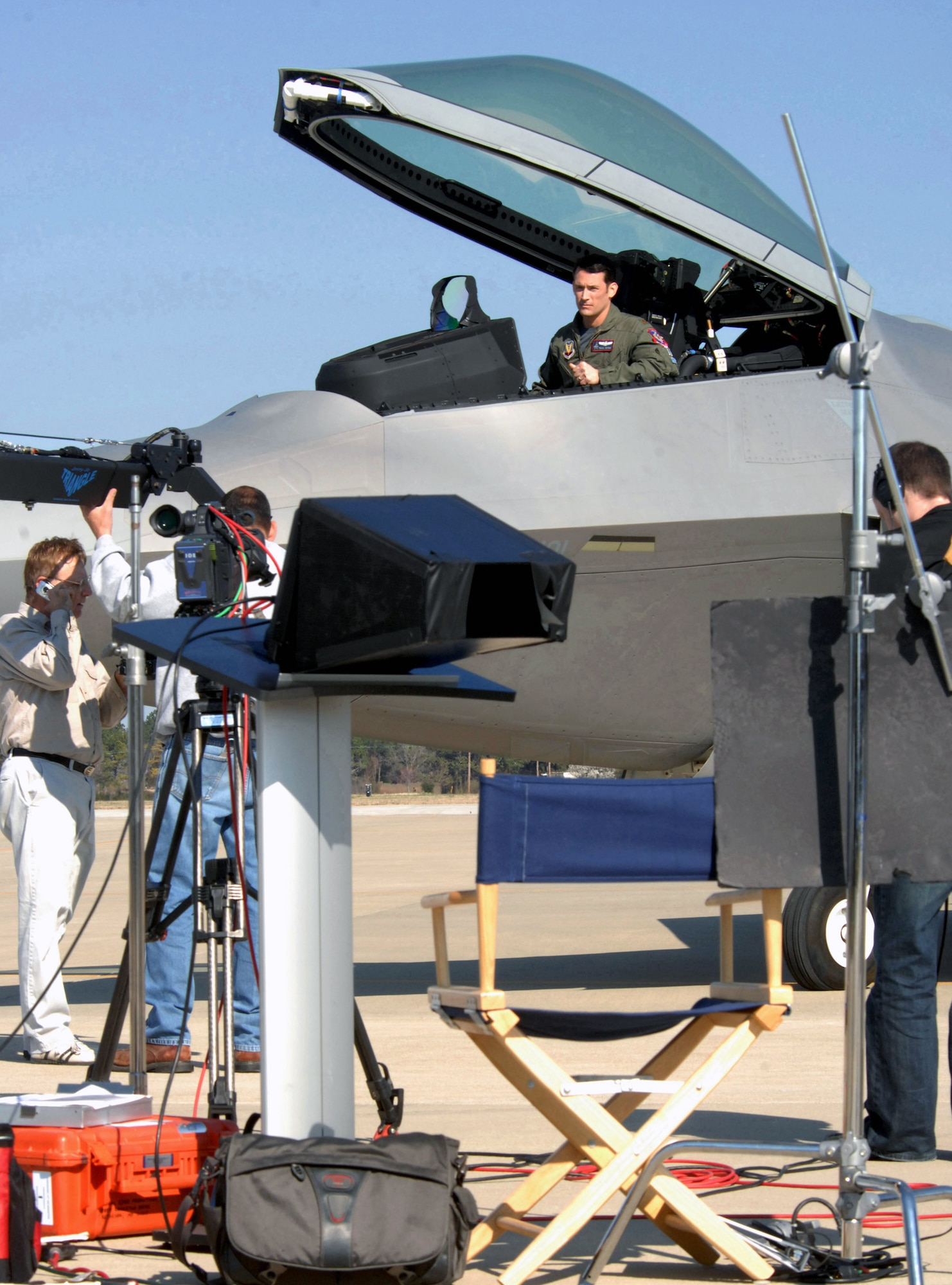 The Discovery Military Channel films an episode March 11 at Langley Air Force Base, Va. The episode, which is part of the series "Showdown: Air Combat," will focus on the F-22 Raptor and its capabilities. Maj. Paul Moga, an F-22 demonstration team pilot, will host the series, which is scheduled to premiere in June and will highlight different military aircraft. (U.S. Air Force photo/Senior Airman Cecil C. McCloud) 

