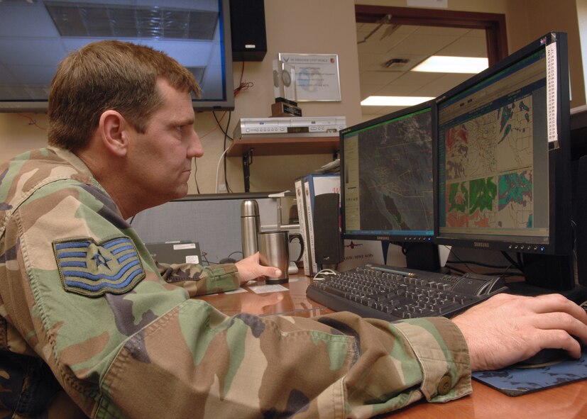 Tech. Sgt. Trevor Crane views satellite imagery and a forecast model to better assist with local forecast predictions at Luke Air Force Base, Ariz. Mar. 18. Sergeant Crane is assigned to the 56th Operations Support Squadron as the assistant NCOIC weather operations. (U.S. Air Force photo/Tech. Sgt. Raheem Moore)