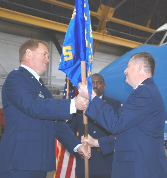 Maj.Clifford Waller accepts the squadron flag from 
Lt.Col. Kirk Peddicord, 932nd Maintenance Group Commander at the 932nd 
Airlift Wing, Scott Air Force Base, IL.
