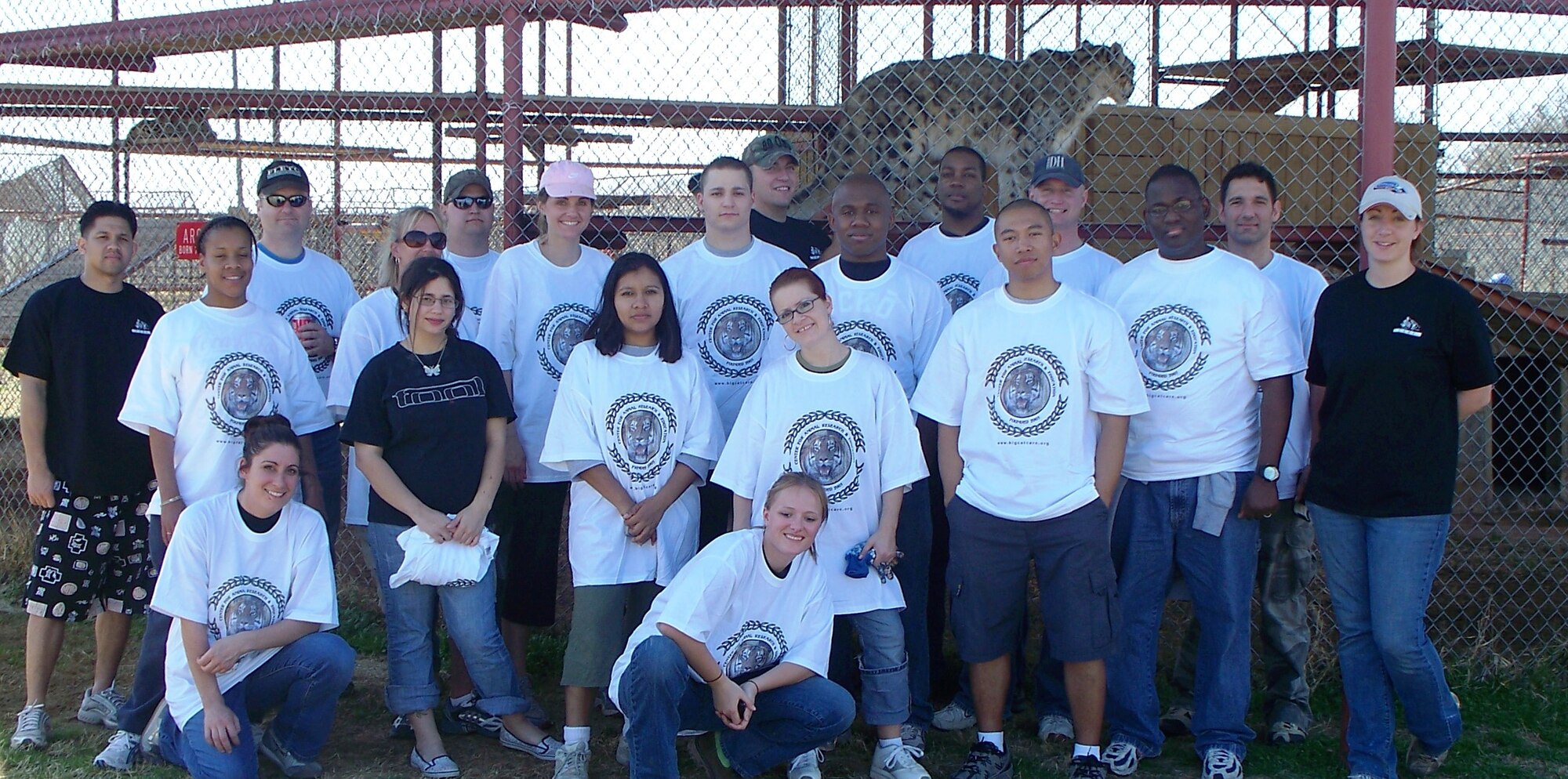 A group of 25 80th OSS personnel volunteered time March 14 to help the Center for Animal Research and Education, near Bridgeport, Texas, clean up and repair a few areas of the Big Cat Habitat. The 80th OSS attempts to complete at least one community service project each month. (Courtesy photo)