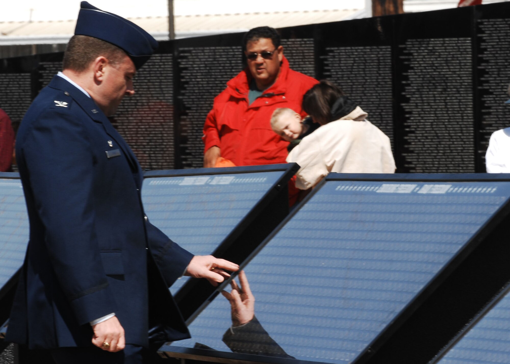 CANNON AIR FORCE BASE, N.M. - Col. Timothy Leahy, 27th Special Operations Wing commander, looks over the names of servicemembers who have given their lives since Vietnam at the Cost of Freedom Memorial. The memorial is one exhibit of the American Veterans Traveling Tribute, which stopped in nearby Clovis, N.M. March 13 - 19. (U.S. Air Force photo by Airman 1st Class Liliana Moreno)