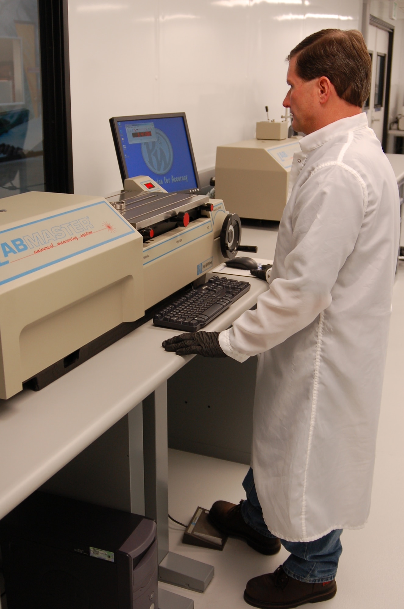 Tim Langen performs a bearing dimensional inspection in the newly opened Bearing Shop, operated by the 530th Commodites Maintenance Squadron.