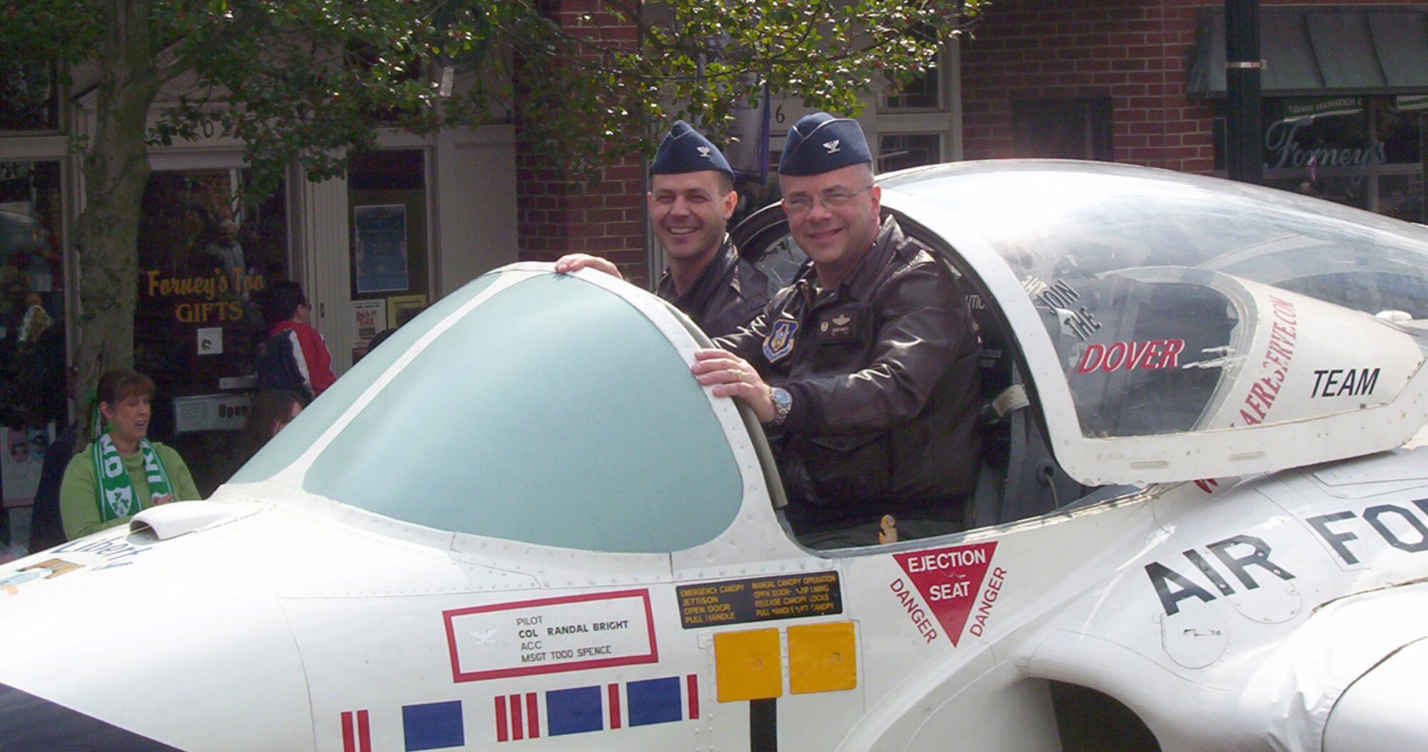 Wing leadership from the 512th and 436th Airlift Wings participated in Dover's 15th Annual St. Patrick's Day Parade March 15 in downtown Dover. Cols. Randal L. Bright and Steven B. Harrison greeted the crowd from the cockpit of a T-37 aircraft named the Liberty Belle. (U.S. Air Force photo/Sue Walls) 