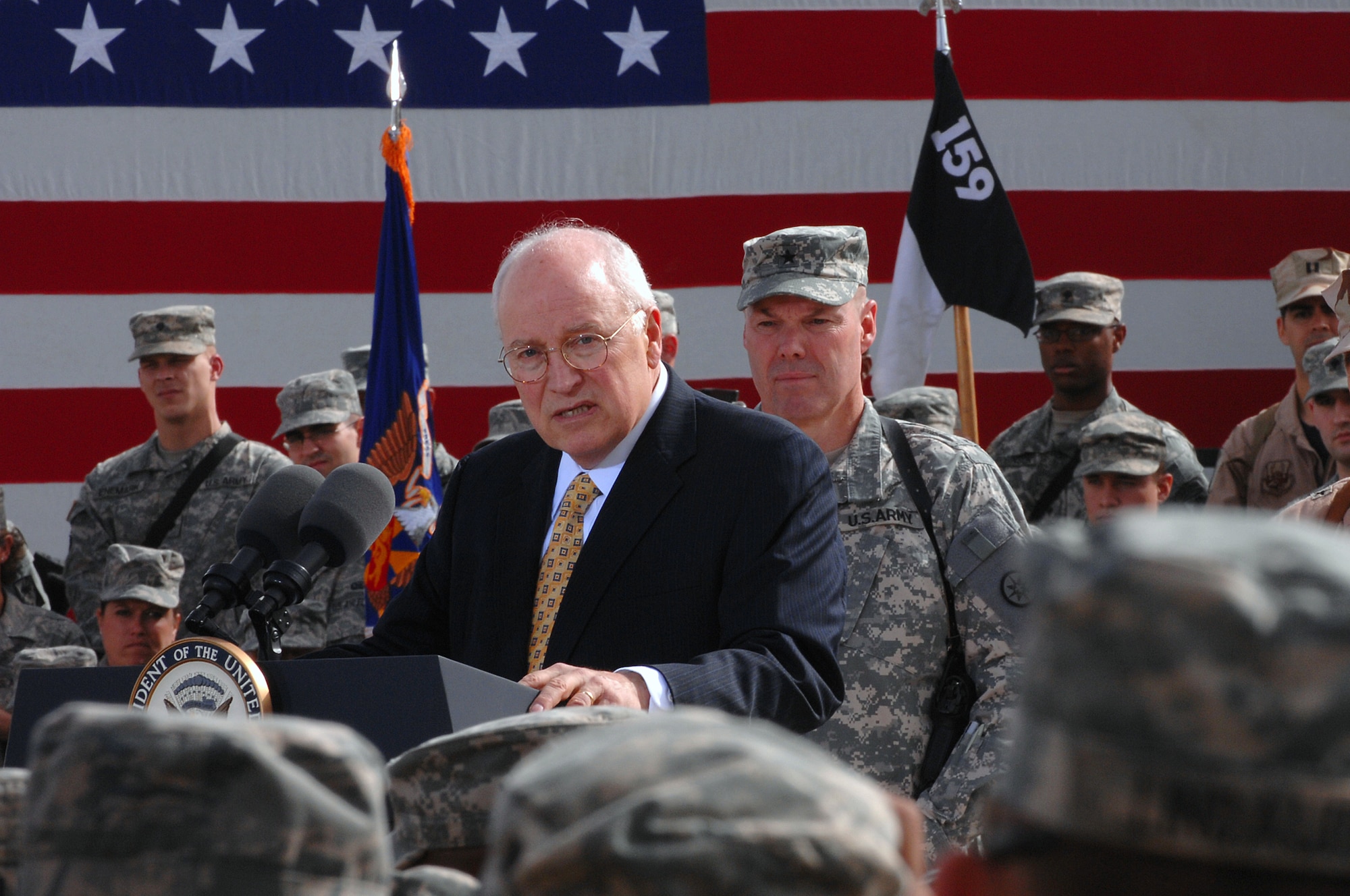 BALAD AIR BASE/ LOGISTICS SUPPORT AREA ANACONDA, Iraq -- U.S. Vice President Dick Cheney speaks to uniformed servicemembers here, March 18. The vice president came to the base to visit deployed military men and women serving in support of Operation Iraqi Freedom. (U.S. Air Force photo/ Senior Airman Julianne Showalter)