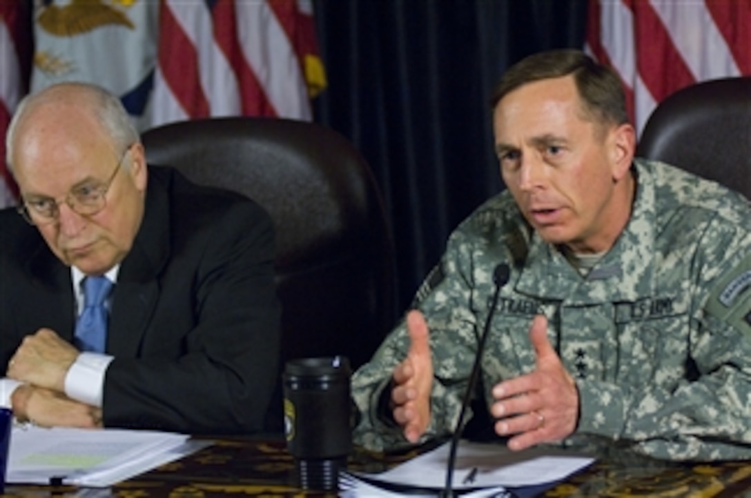 Commander, Multi-National Force - Iraq Gen. David Petraeus, U.S. Army, answers a reporter's question during a press conference with Vice President Dick Cheney in Baghdad, Iraq, on March 17, 2008.  Cheney visited key Iraqi officials and U.S. leadership as part of a Middle East tour to enhance relations with key partners in the region.  