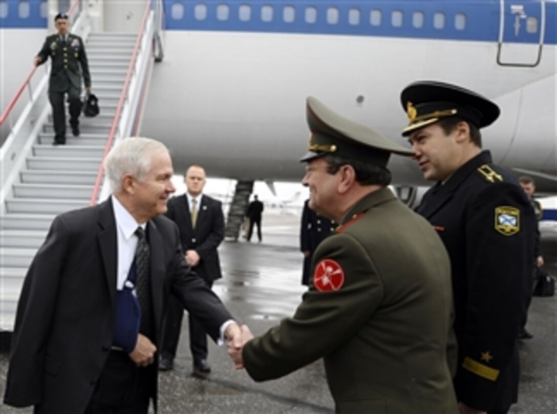 Russian army Gen. Vladimir Nikishin greets U.S. Defense Secretary Robert M. Gates upon his arrival at Vnukovo International Airport near Moscow, March 17, 2008.