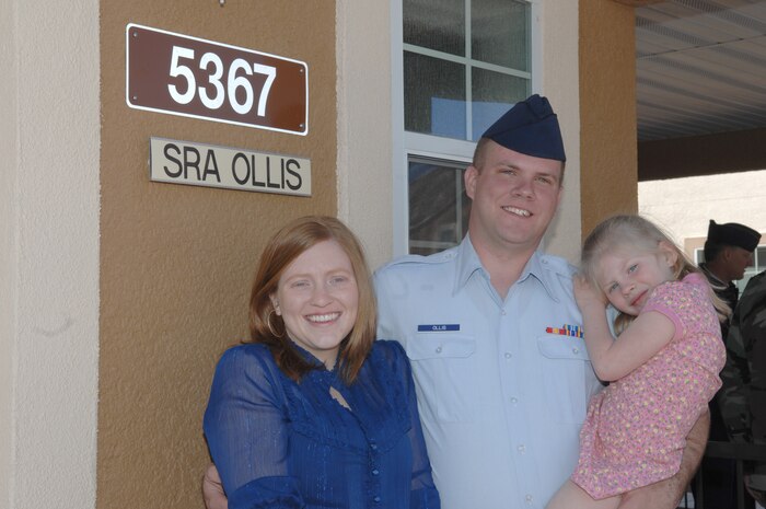 NELLIS AIR FORCE BASE, Nev. -- Senior Airman Nathan Ollis, spouse Caitlin and daughter Juliana are the first family to occupy a home in Nellis Air Force Base’s new privatized housing area, The Landings at Nellis. (U.S. Air Force photo by Senior Airman Larry Reid) 