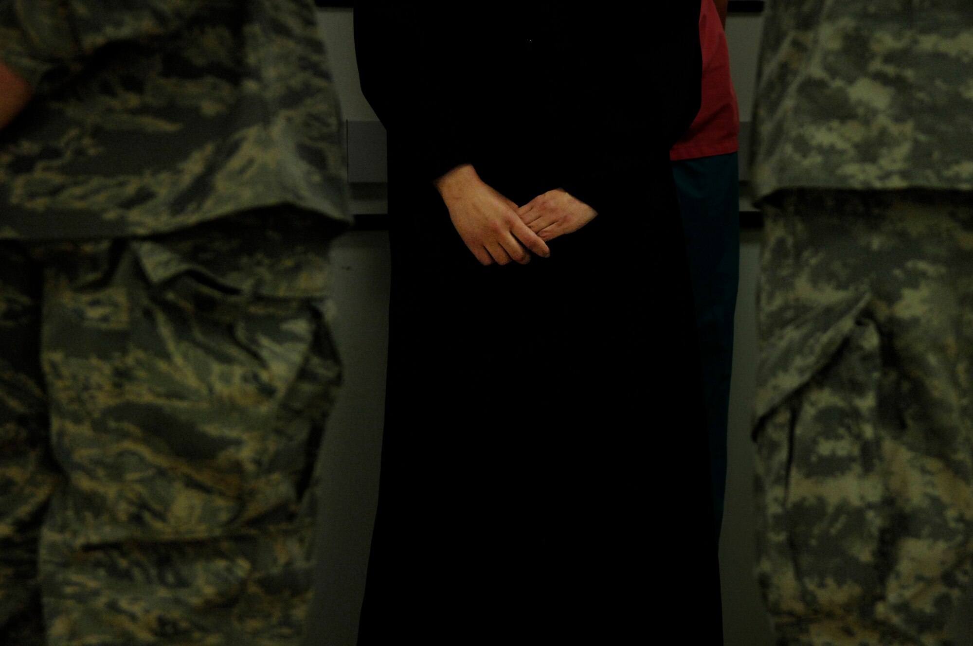 BALAD AIR BASE, Iraq -- Amil, the mother of Al Amreeki,  a 3-year-old burn victim thanks the staff the Air Force Theater Hospital for saving her son's life at Balad Air Base, Iraq on March 19. (U.S. Air Force Photo/Tech. Sgt. Jeffrey Allen) 
