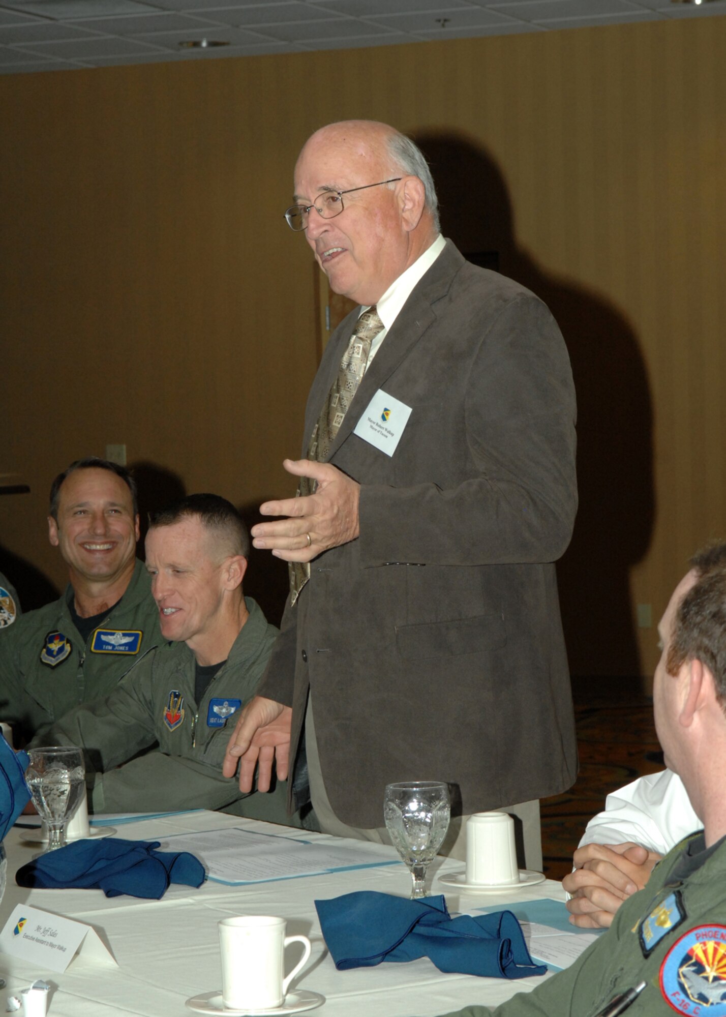 The Honorable Mayor of Tucson Bob Walkup, welcomes Arizona's military leaders at the Arizona Commanders Summit at the Mirage Officer's Club here March 19. The mission of the Arizona Commanders Summit is to promulgate an environment of cooperation among all the state’s military installations to better sustain military facilities, ranges and air space, and ensure the highest possible level of training operations.(U.S. Air Force photo by Airman 1st Class Noah R. Johnson)