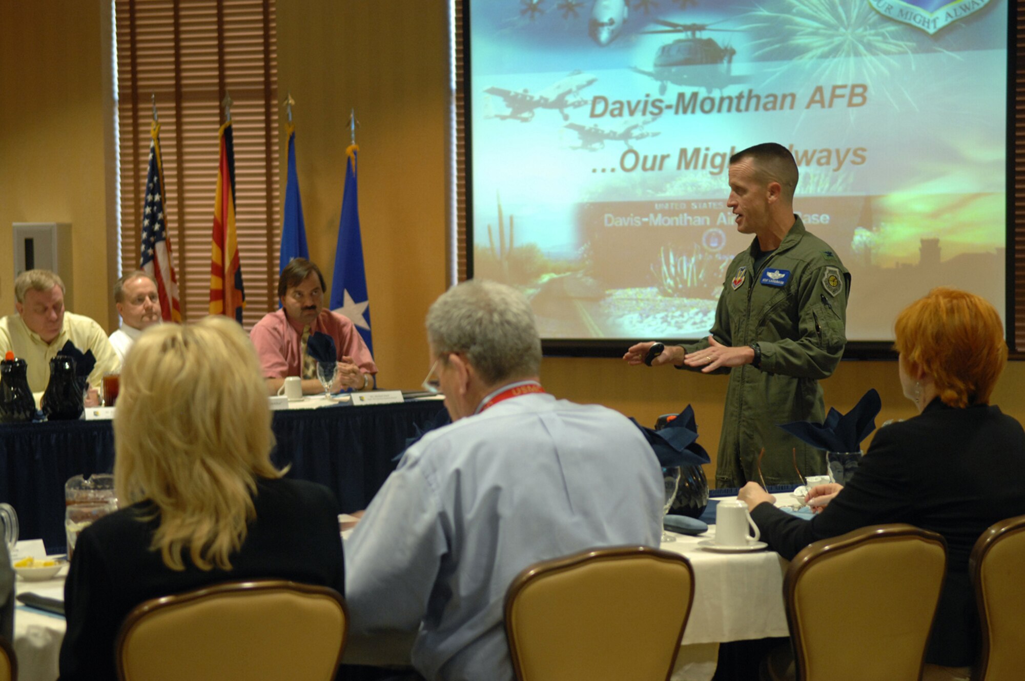 Col. Kent Laughbaum, 355th Fighter Wing commander, speaks at the Arizona Commanders Summit at the Mirage Officer's Club here March 19. The mission of the Arizona Commanders Summit is to promulgate an environment of cooperation among all the state’s military installations to better sustain military facilities, ranges and air space, and ensure the highest possible level of training operations.(U.S. Air Force photo by Airman 1st Class Noah R. Johnson)