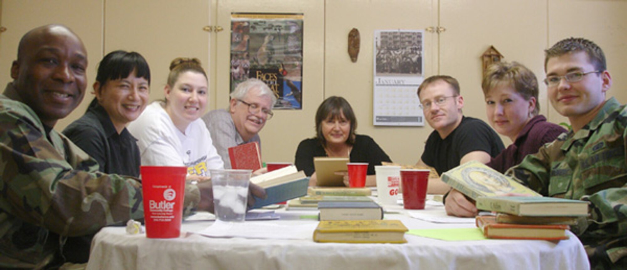 Members from the 22nd Contracting Squadron help sort through and pack books for the Books for Life program Jan 30, in Wichita. These books are scheduled to make their way to marginalized areas of developing countries, providing resources for children’s education. (courtesy photo)  
