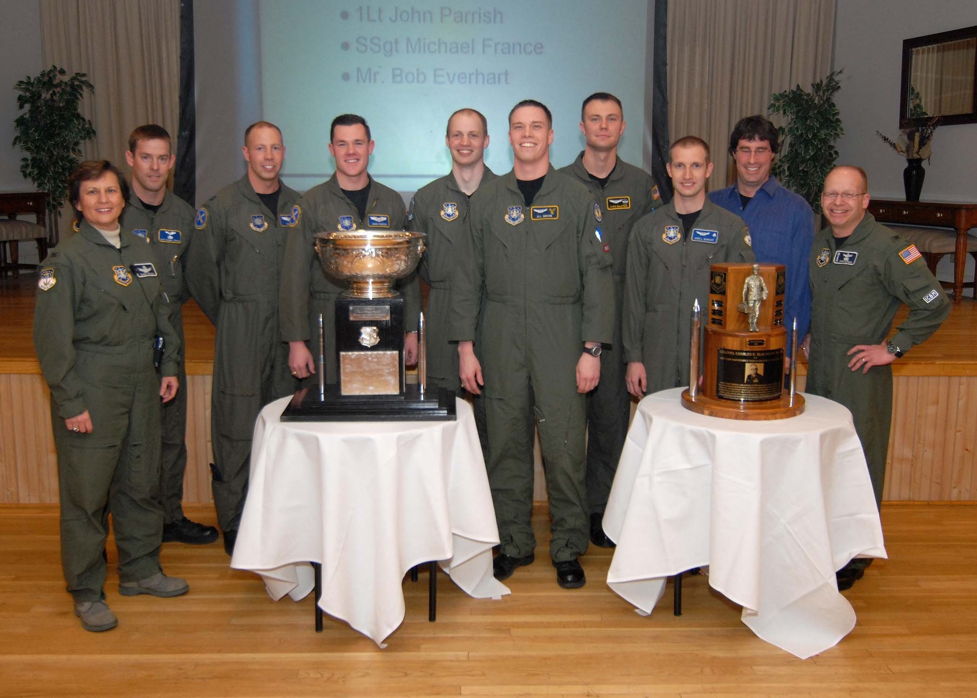 The members of the 341st Operations Group Guardian Challenge team pose with Wing Commander Col. Sandy Finan (left), Military Affairs Committee Chairman David Weissman (second from right) and 341st OG Commander Col. David Durgan (right). Team members from left to right are:Staff Sgt. Michael France, Capt. Daran Gaus and 1st Lt. John Parrish, 40th Helicopter Squadron; 1st Lt. John Smith, 564th Missile Squadron; 1st Lts. Chris Balsters and Darrell Gibson, 341st Operations Support Squadron; and 1st Lt. Jared Gearhart, 10th Missile Squadron. (U.S. Air Force photo/John Turner)
