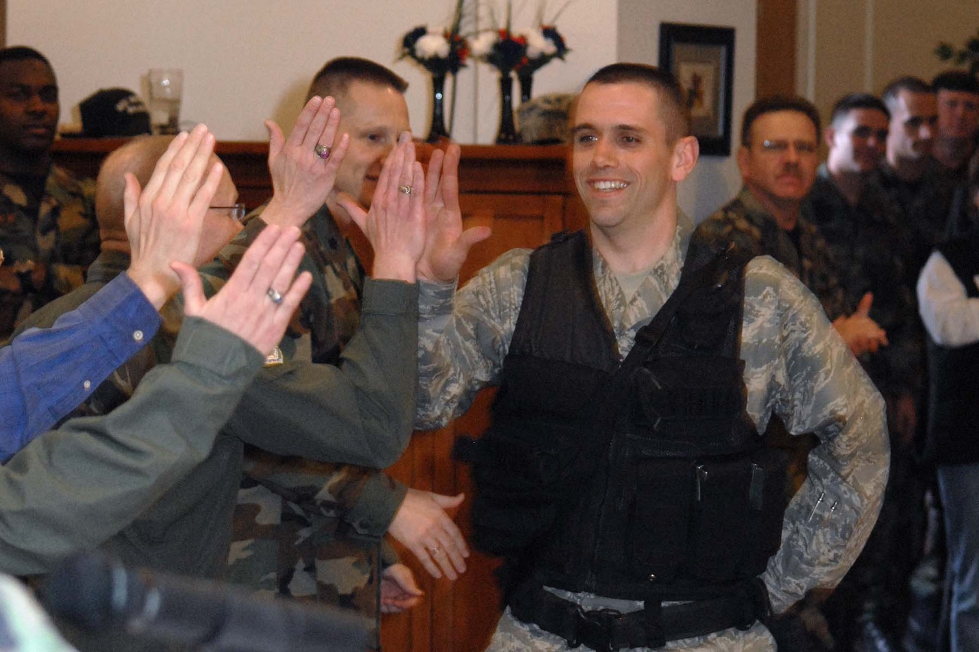 2nd Lt. David Lycan, 341st Missile Security Forces Squadron and member of the Security Forces Group Guardian Challenge team, is congratulated by members of the wing leadership. Malmstrom held the kick off event March 14 where the members of the three teams were introduced. (U.S. Air Force photo/John Turner)