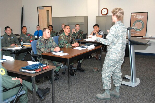 TRAVIS AIR FORCE BASE, Calif. -- Fresh and new: Newly assigned Airmen are welcomed by Col. Maryanne Miller, 349th Air Mobility Wing commander during a Newcomers briefing. The 349th AMW is the largest associate wing in the United States Air Force Reserve Command. (U.S. Air Force photo/Tech Sgt. Tony Castro)