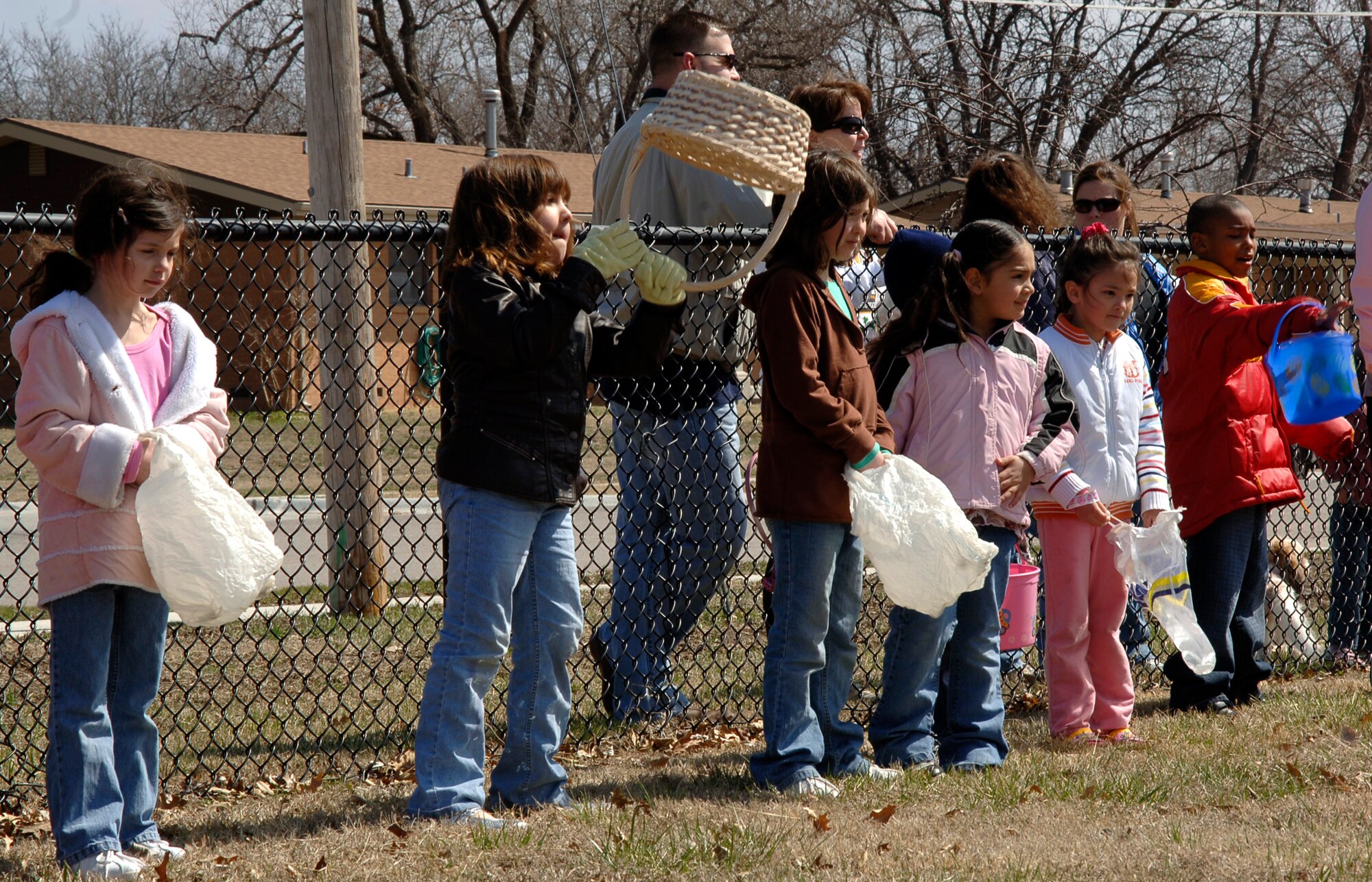 MCCONNELL AIR FORCE BASE Kan. -- McConnell children wait for the Easter bunny to signal the start of an Easter egg hunt March 15, at the Southwind baseball fields.  Three Easter egg hunts were held for age groups 4 years and under, five to eight years, and 9 and up. (Photo by Airman 1st Class Maria Ruiz)