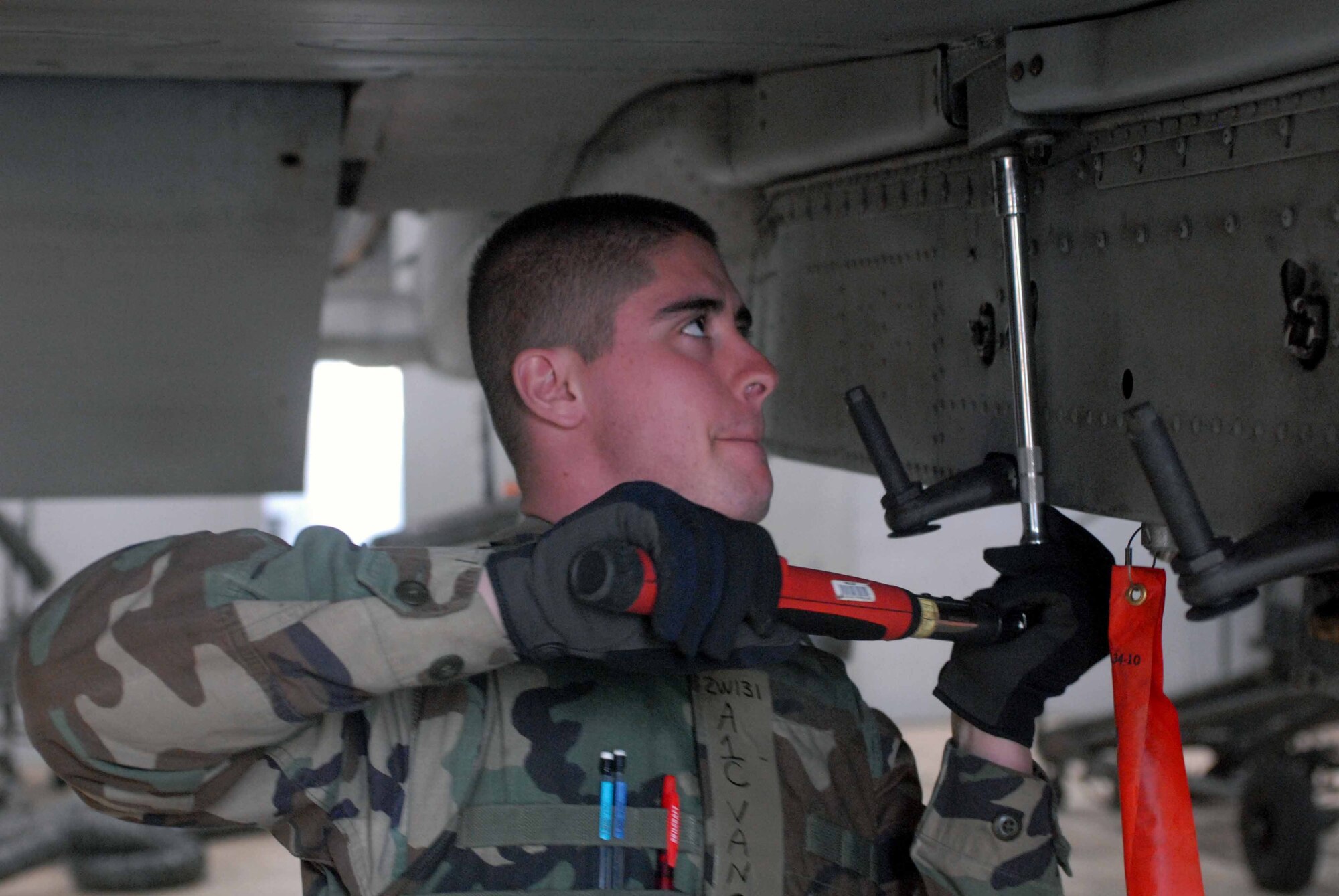 OSAN AIR BASE, Republic of Korea – Airman 1st Class Travis Van Cott 51st Aircraft Maintenance Squadron weapons aircraft team member, torques pylon bolts on the A-10 Thunderbolt II during a daily maintenance inspection March 18. (U.S. Air Force photo/Staff Sgt. Lakisha Croley)